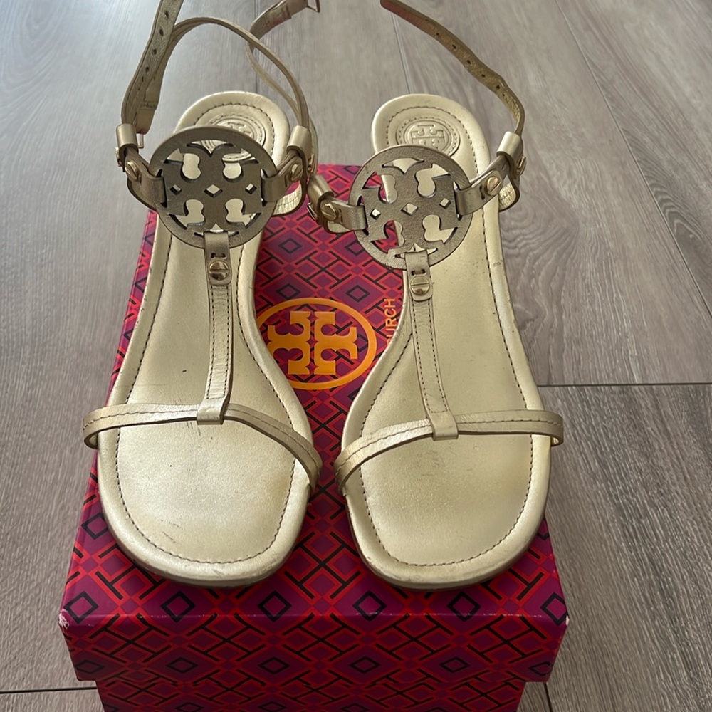 Brand new gold Tory Burch sandals.